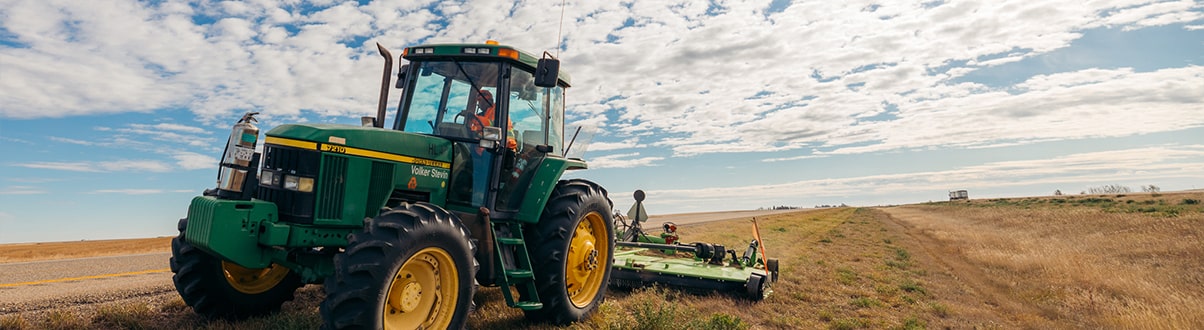 Roadside grass maintenance tractor